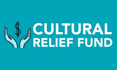 Two teal hands with open palms and a dollar sign in between them, against a blue background. White text to the right reads "Cultural Relief Fund."