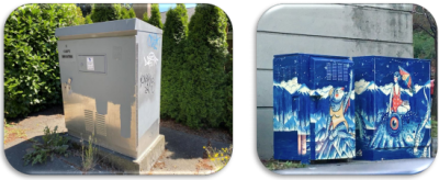 Two public utility boxes, one plain grey metal and one painted with a mural.
