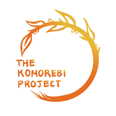 Orange, red, and yellow plant vine in a circle shape. Text reads "The Komorebi Project."