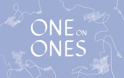 White text on lavender background reads "One on Ones." White squiggly lines texture the background.