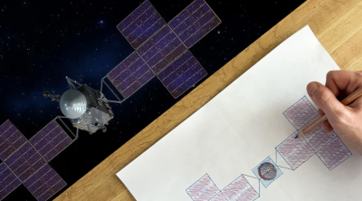 Hand drawing a pencil sketch of a satellite