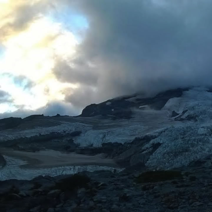 a view of the snowfield at sunset