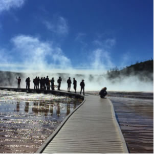 Students on a boardwalk at Yellowstone