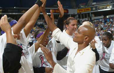 Photo - honoree Edna Campbell (former Seattle Storm player, breast cancer survivor) and teammates fundraising for breast cancer