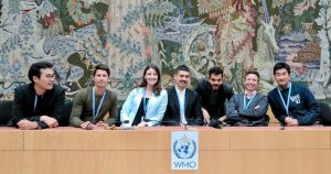 Nathaniel sits with fellow World Meteorological Organization summer interns in Geneva