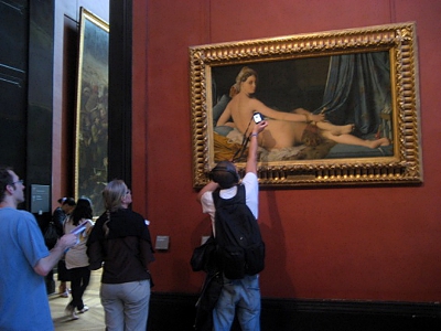 tourist at the Louvre