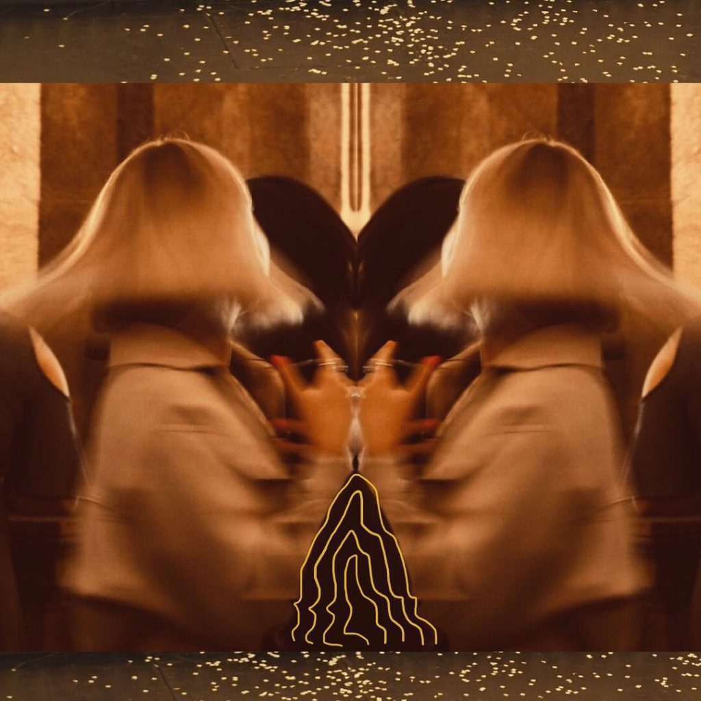 mirror image of woman spinning