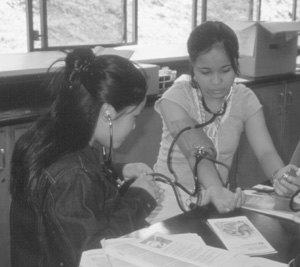 Picture of student taking blood pressure measurement