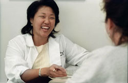 Dr. Elaine Wong with a patient
