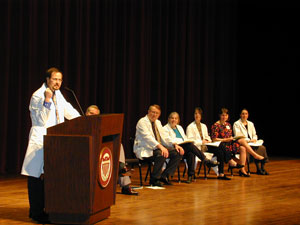 speaker at the podium during ceremony