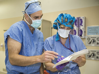 David Flum (left) discusses the upcoming surgery.
