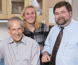 Photo of Dr. Ake Lernmark (left) in the Molecular and Genetics Core Lab of the Diabetes Research Center with fellow scientists Libby Rutledge (center) and Armand McMurray (right).