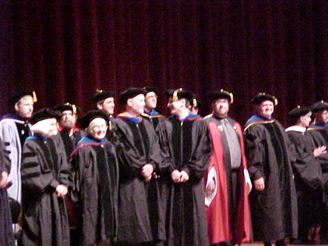 Faculty on stage