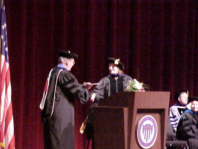 Prof Dunn presenting award