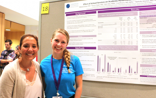 An HIPRC faculty mentor and intern discuss their summer project at the 2017 INSIGHT Research Symposium.