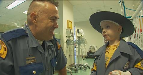 Shane Dutton, right, was a "state trooper for a day" at Harborview Medical Center, and spent some of his time telling the story of his injuries.