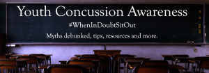 A classroom with the phrases “Youth Concussion Awareness,” “#WhenInDoubtSitOut” and “Myths debunked, tips, resources and more” written on a chalkboard.