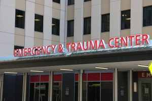 The emergency entrance at Harborview Medical Center, with the sign "Emergency and Trauma Center."