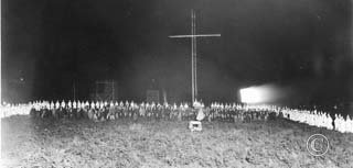 Electric cross at KKK rally, c. 1923. Photo: Washington State Historical Society.