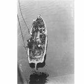 rew coiling cable on work boat as seen from deck of U_S_ Cableship Dellwood_ Trocadero Bay_ Alaska_ May 24_ 1924 