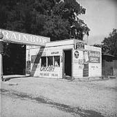 Shacktown grocery store and filling station, typical of many such small enterprises in new community (Sumac Park).