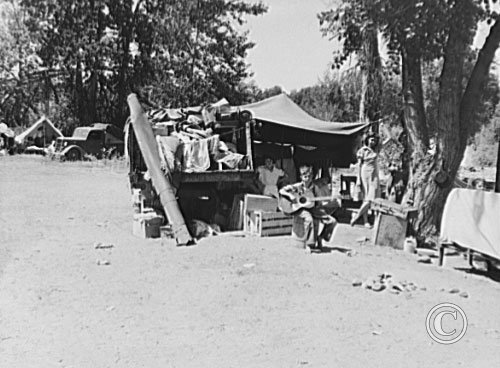 Camp of family with nine children who have been on the road for three years.