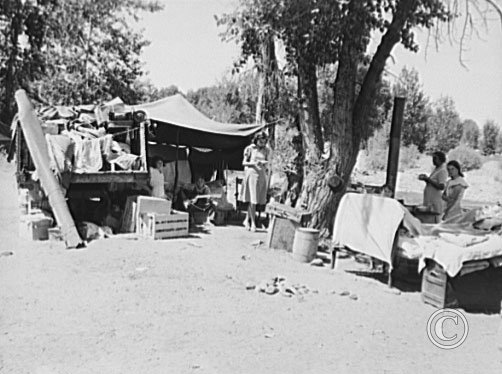 Camp of family with nine children who have been on the road for three years.