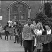 Pickets support BSU sit-in. Jimmy Groves holds "300 More Black Students" sign