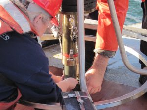 Close up of researcher using Craib Corer