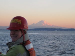 Researcher and Mount Rainier as seen from deck of R/V Barnes