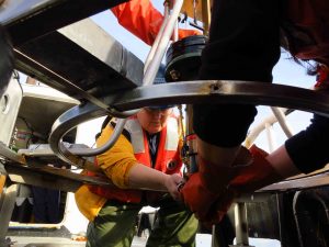 Scientists running experiments aboard R/V Barnes