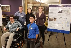 Team DISplay at the 2017 design review presenting their poster and prototype of an interactive game board for diverse abilities.