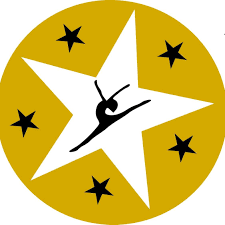 Yellow circle with large white star in the center, dotted with smaller black stars. Black silhouetted dancing figure is in the center of the white star.