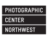 White text on black background reads "Photographic Center Northwest"