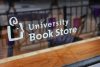 White vinyl text on a window reading "University Book Store"
