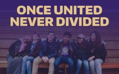 Group of six smiling young adults seated on a bench, their arms over each other shoulders. Gold text reads "Once united never divided."