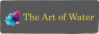 Yellow text on a grey background reads "The art of water." To the left of the text are watercolor marks, in blue and pink paint.
