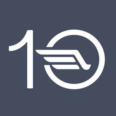 White logo on dark grey background of the number ten, with vectorized wings on the 0.