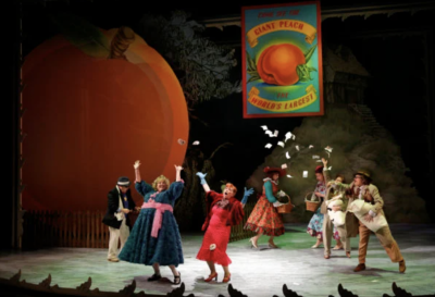 Actors on a stage performing play version of "James and the Giant Peach"