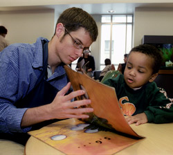 O'Dea student reading to a child