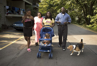 Solomon Taylor goes for a stroller ride with his family and beagle.