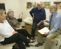 Dr. Bird meets with a family at the Neruogenetics Clinic.