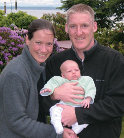 Photo of Elizabeth Hutchinson and her husband and son.
