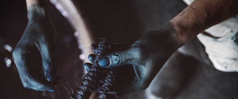 Takayuki Ishii working with indigo dye