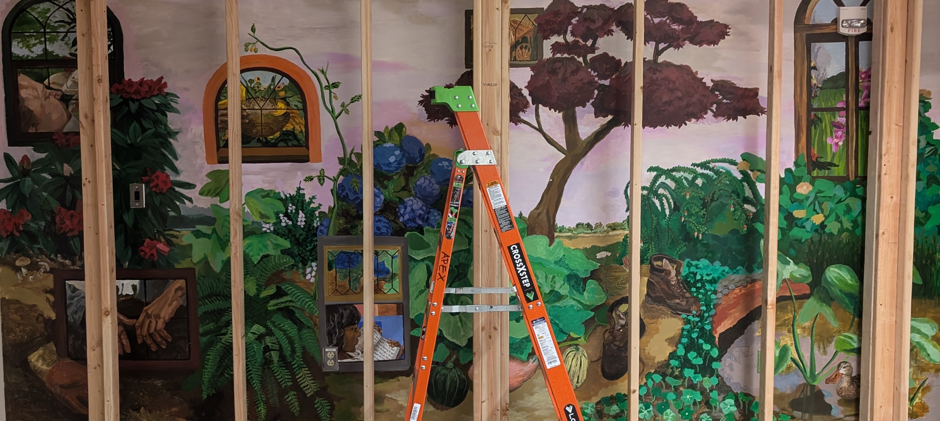 The new mural, In a Planted Place, as construction began in the Program room