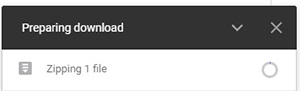 Image of a browser pop-up in the bottom right corner that lets the user know a zip folder is being prepared.