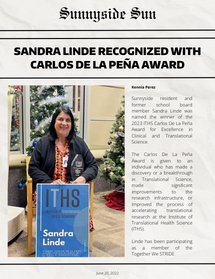 Newspaper showing Sandra Linde receiving the Carlos de la Peña Award