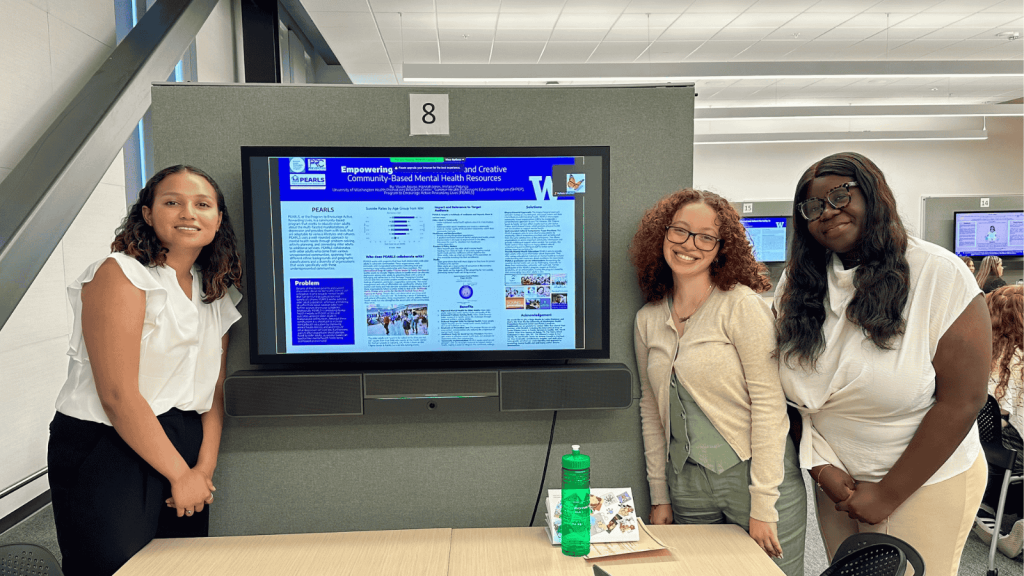 Hannah Jones, Melanie Polanco and Vivian Agugo (PEARLS scholars) stand next to their poster.
