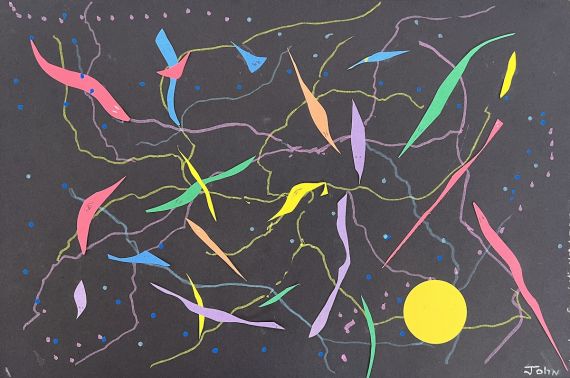 Colorful shapes of paper against a black background