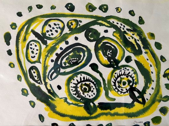 Green and yellow circles and dots on paper